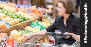 Womans shops for produce